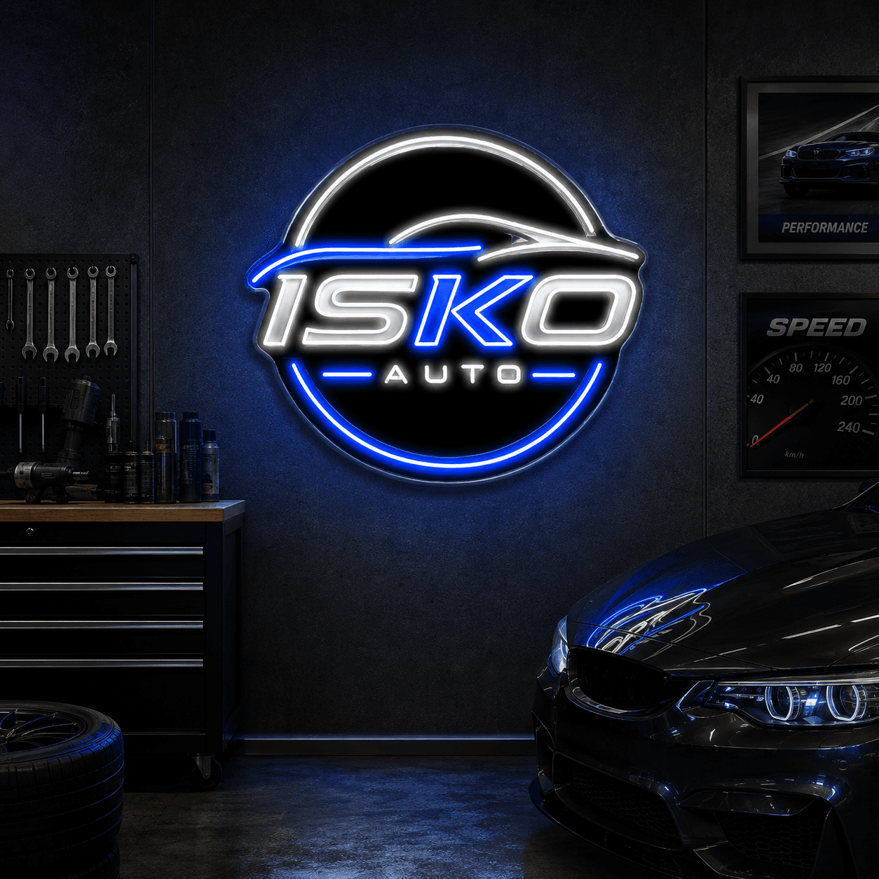 The ISKO Auto neon sign glowing on a dark garage wall